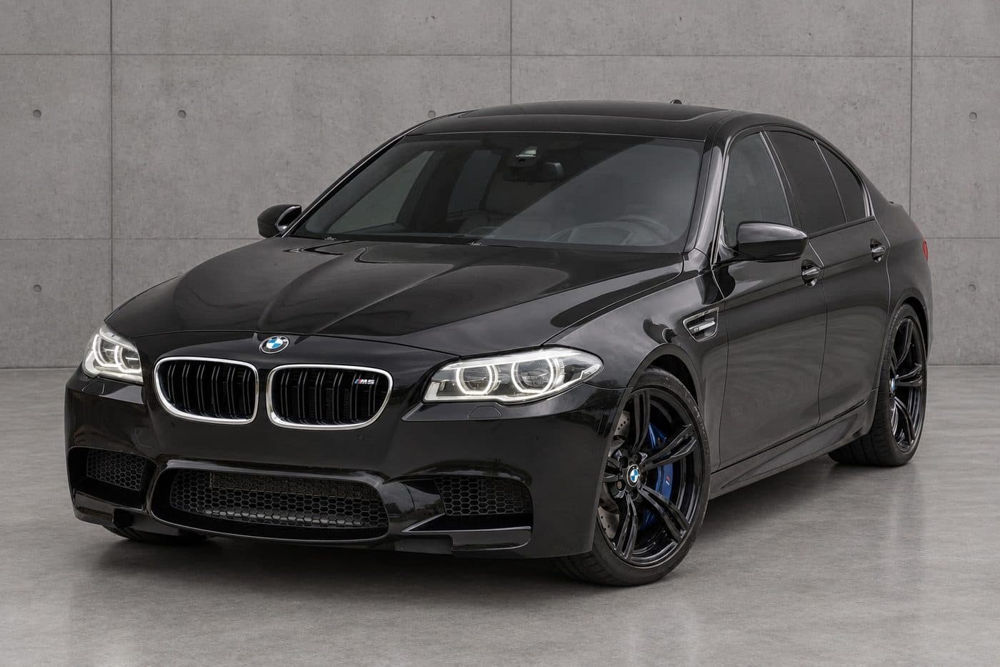 BMW M5 in the Concrete scene, created with CarStudio